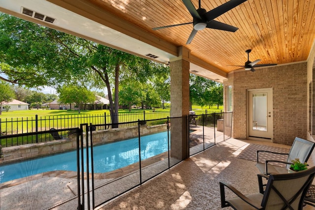10833 Olympia Fields Loop, Austin, TX 78747 - view of swimming pool with ceiling fan, a fenced backyard, and a patio area