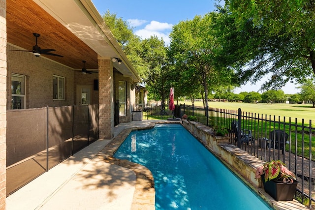 10833 Olympia Fields Loop, Austin, TX 78747 - view of pool featuring a ceiling fan and view of golf course