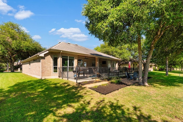 10833 Olympia Fields Loop, Austin, TX 78747 - back of house featuring a patio, a ceiling fan, and brick siding