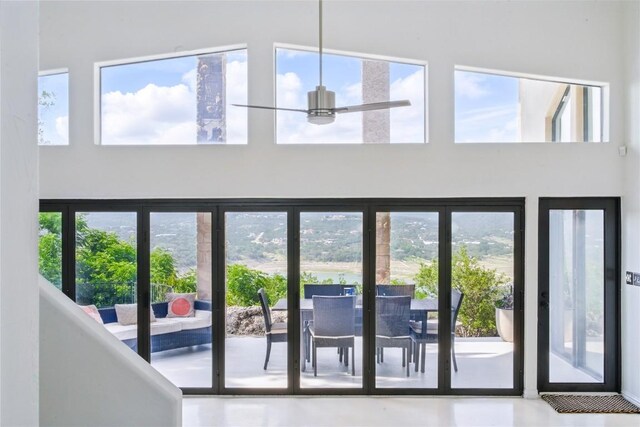 13902 Panorama Dr, Austin, TX 78732 - doorway to outside featuring a towering ceiling