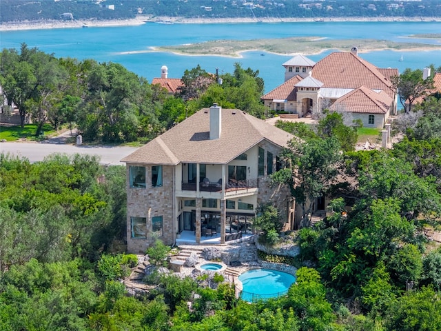 13902 Panorama Dr, Austin, TX 78732 - view of subject property featuring a pool area and a large body of water