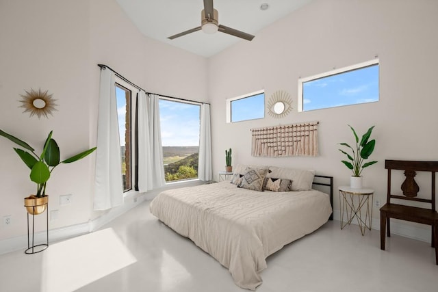13902 Panorama Dr, Austin, TX 78732 - bedroom featuring concrete flooring and ceiling fan