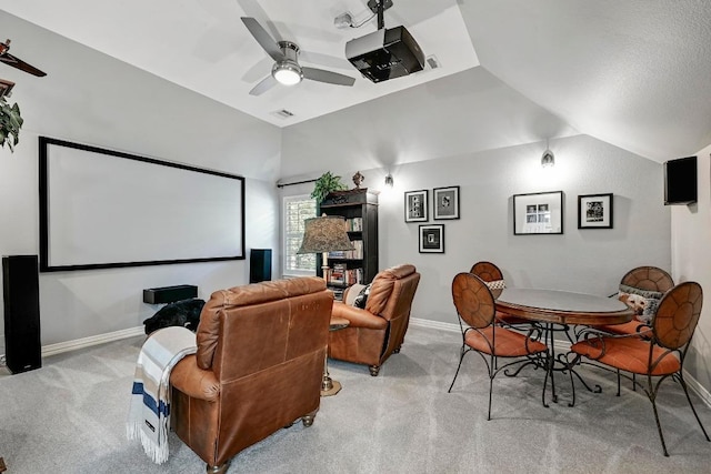 404 Riley Trl, Cedar Park, TX 78613 - cinema featuring light carpet, baseboards, ceiling fan, and vaulted ceiling