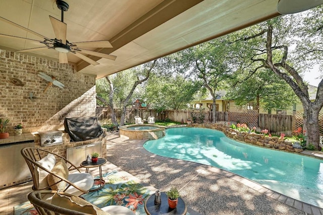 404 Riley Trl, Cedar Park, TX 78613 - view of swimming pool with a fenced backyard, a ceiling fan, a pool with connected hot tub, and a patio