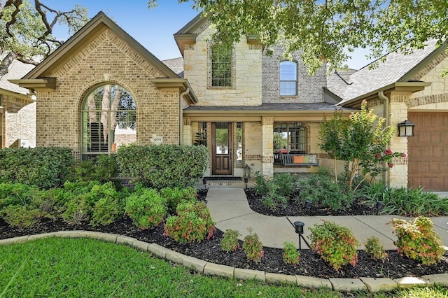 404 Riley Trl, Cedar Park, TX 78613 - view of front of property with stone siding, brick siding, and an attached garage