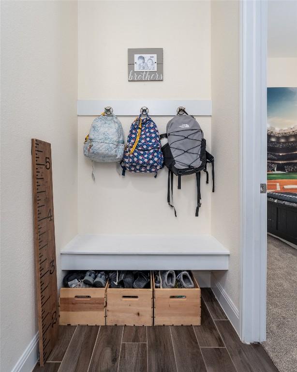 1225 Grassy Field Rd, Austin, TX 78737 - mudroom featuring baseboards and wood tiled floors