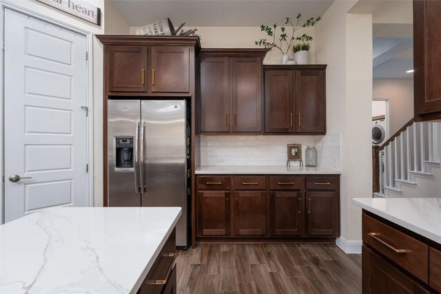 1225 Grassy Field Rd, Austin, TX 78737 - kitchen featuring stainless steel fridge with ice dispenser, dark wood finished floors, tasteful backsplash, dark brown cabinetry, and light stone counters