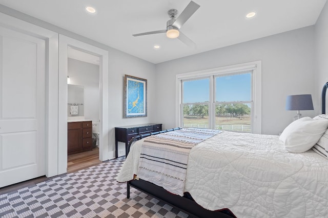 260 Unbridled, Austin, TX 78737 - bedroom featuring recessed lighting, a ceiling fan, ensuite bath, and light carpet