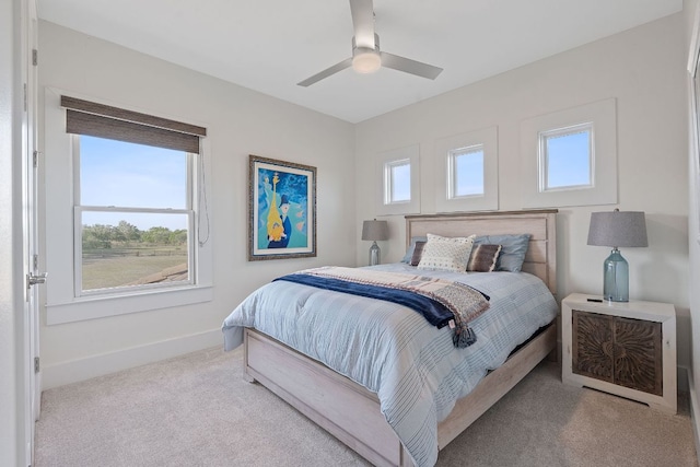 260 Unbridled, Austin, TX 78737 - bedroom with carpet flooring, baseboards, and a ceiling fan