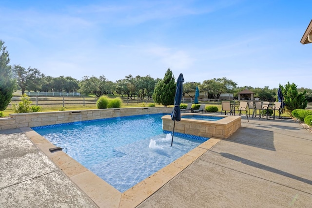 260 Unbridled, Austin, TX 78737 - view of swimming pool featuring a patio area and a pool with connected hot tub