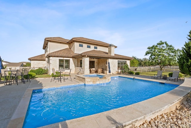 260 Unbridled, Austin, TX 78737 - view of pool with a patio area and a pool with connected hot tub