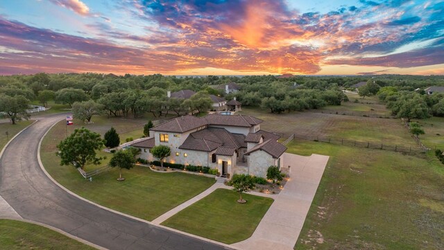 260 Unbridled, Austin, TX 78737 - view of subject property with a tree filled landscape