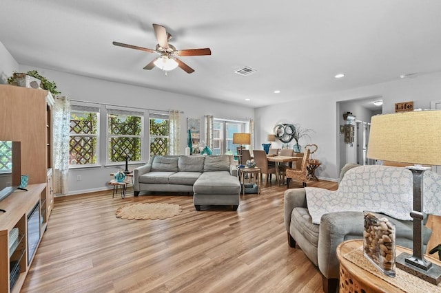 921 Stampede Rd, San Marcos, TX 78666 - living room with light wood-style floors, a ceiling fan, recessed lighting, and baseboards