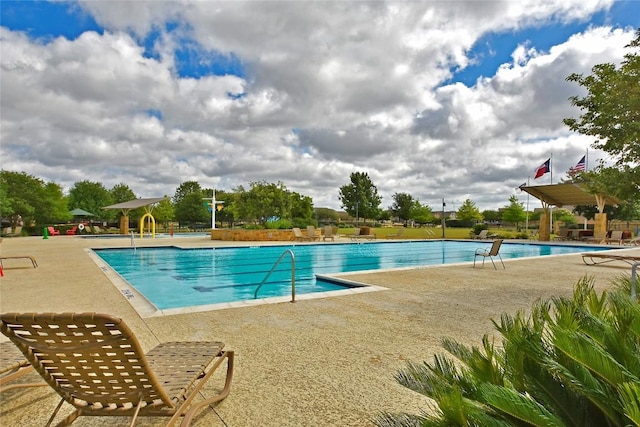 921 Stampede Rd, San Marcos, TX 78666 - community pool with a patio area
