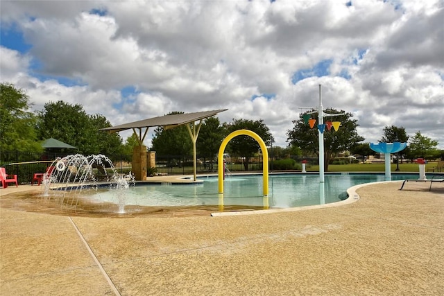 921 Stampede Rd, San Marcos, TX 78666 - community pool featuring a water play area