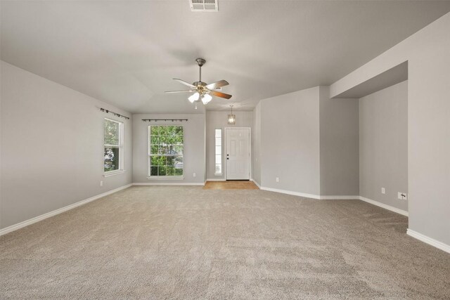 2128 Pearson Way, Round Rock, TX 78665 - empty room with carpet, a ceiling fan, and baseboards