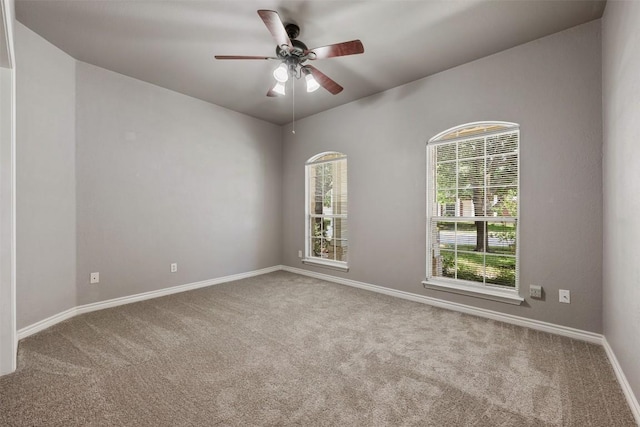 2128 Pearson Way, Round Rock, TX 78665 - empty room featuring carpet flooring, ceiling fan, and baseboards