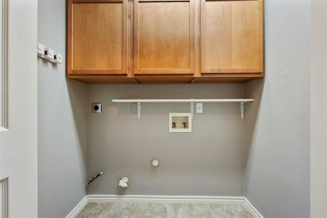 2128 Pearson Way, Round Rock, TX 78665 - laundry room featuring hookup for a gas dryer, hookup for a washing machine, baseboards, and cabinet space