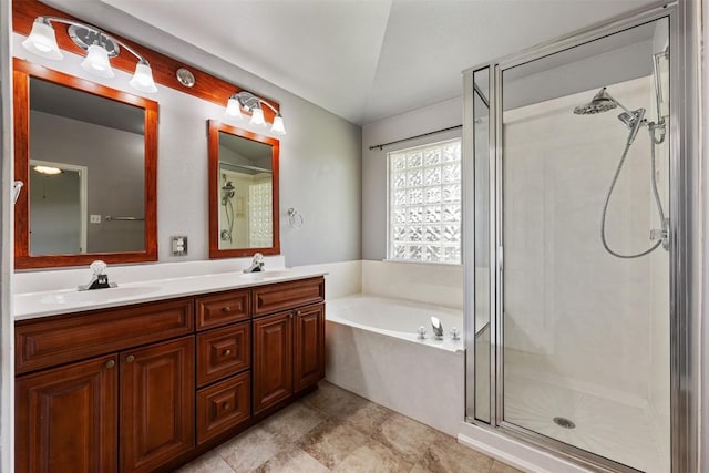2128 Pearson Way, Round Rock, TX 78665 - full bathroom featuring a shower stall, a garden tub, and double vanity