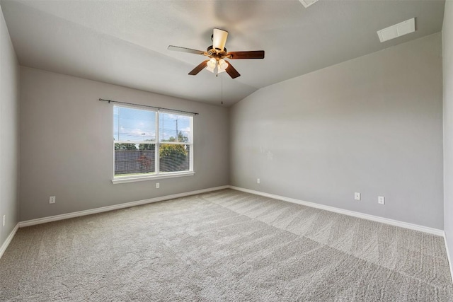 2128 Pearson Way, Round Rock, TX 78665 - unfurnished room with light carpet, baseboards, ceiling fan, and vaulted ceiling