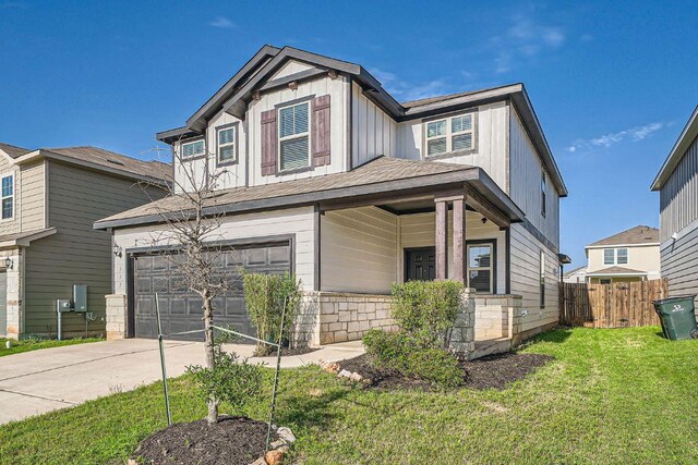 137 Green Egret Way, Leander, TX 78641 - view of front facade with concrete driveway, a garage, and board and batten siding