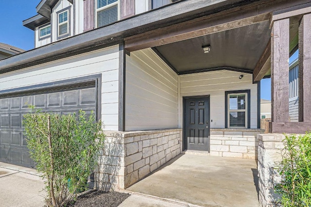 137 Green Egret Way, Leander, TX 78641 - doorway to property with covered porch and stone siding