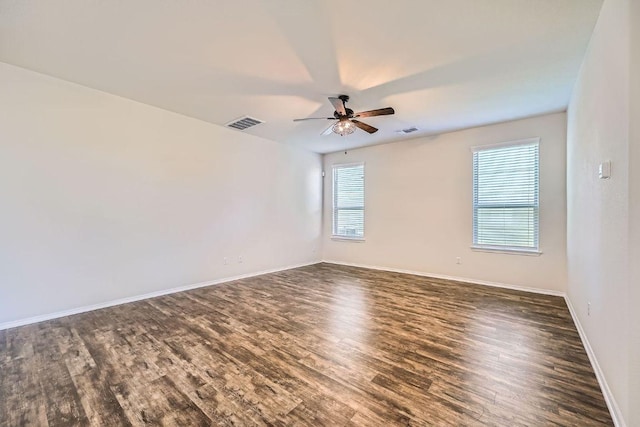 137 Green Egret Way, Leander, TX 78641 - unfurnished room with wood finished floors, ceiling fan, and baseboards