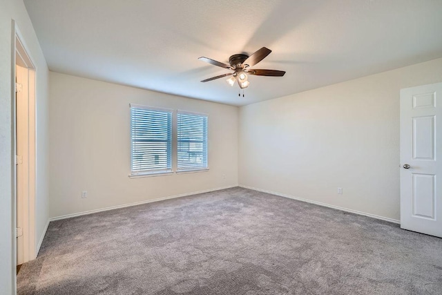 137 Green Egret Way, Leander, TX 78641 - empty room with carpet flooring, a ceiling fan, and baseboards