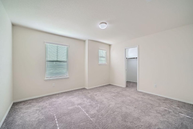137 Green Egret Way, Leander, TX 78641 - empty room with carpet and baseboards