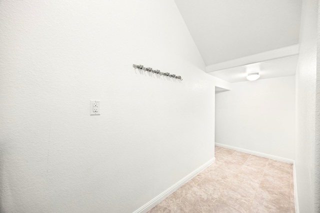 313 Pearl Way, Buda, TX 78610 - corridor featuring lofted ceiling and light tile patterned floors