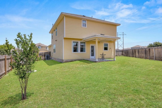 313 Pearl Way, Buda, TX 78610 - back of house with a fenced backyard and a patio area