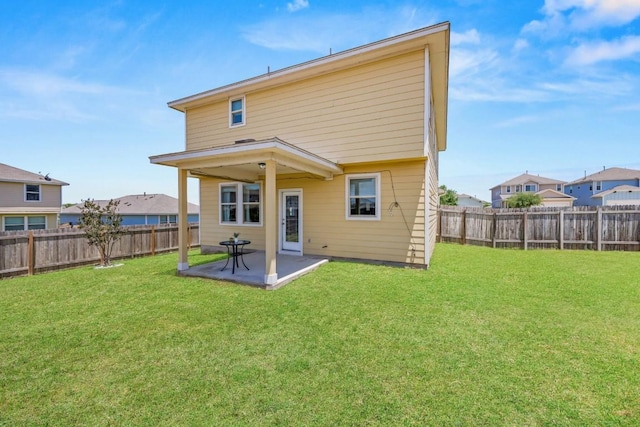 313 Pearl Way, Buda, TX 78610 - back of house with a fenced backyard, a patio, and a residential view