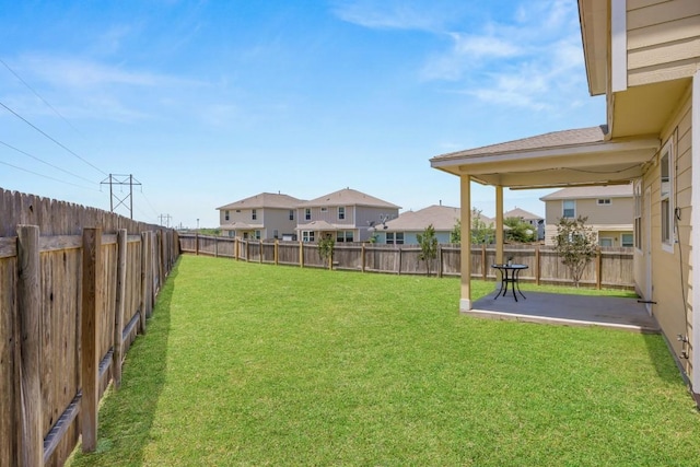 313 Pearl Way, Buda, TX 78610 - fenced backyard with a patio