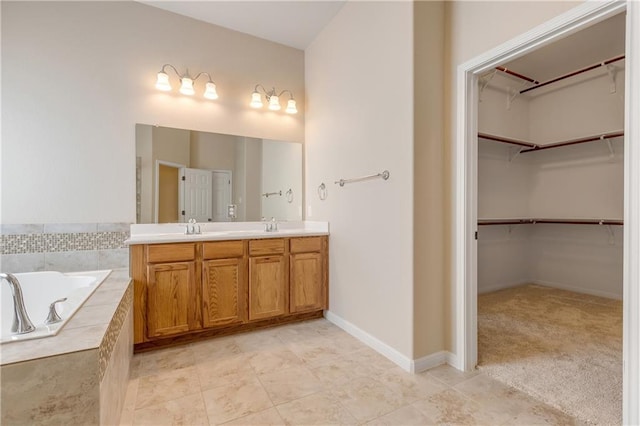 1911 Nelson Ranch Loop, Cedar Park, TX 78613 - full bath featuring double vanity, a bath, a spacious closet, and tile patterned floors