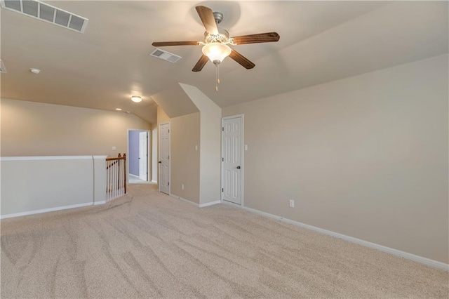 1911 Nelson Ranch Loop, Cedar Park, TX 78613 - spare room featuring ceiling fan, lofted ceiling, light carpet, and baseboards
