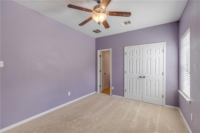 1911 Nelson Ranch Loop, Cedar Park, TX 78613 - unfurnished bedroom with light colored carpet, a closet, baseboards, and a ceiling fan