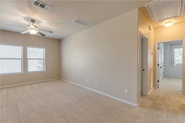 1911 Nelson Ranch Loop, Cedar Park, TX 78613 - unfurnished room with attic access, light colored carpet, ceiling fan, and baseboards