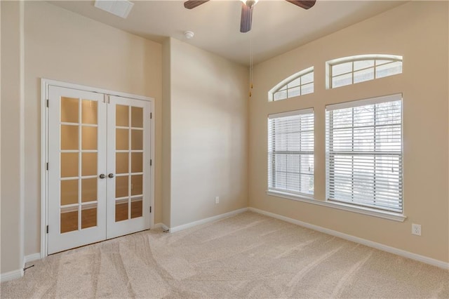 1911 Nelson Ranch Loop, Cedar Park, TX 78613 - carpeted spare room featuring french doors, a ceiling fan, and baseboards