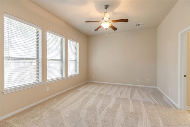 1911 Nelson Ranch Loop, Cedar Park, TX 78613 - empty room featuring light colored carpet, ceiling fan, and baseboards