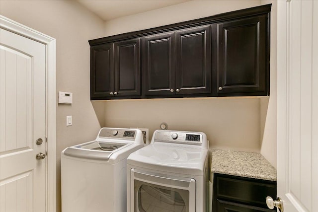 3908 Crispin Hall Ln, Pflugerville, TX 78660 - laundry room featuring cabinet space and washing machine and dryer