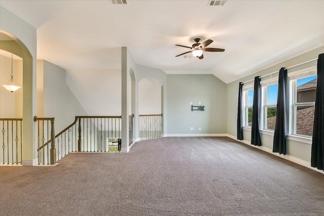 3908 Crispin Hall Ln, Pflugerville, TX 78660 - carpeted spare room with ceiling fan, vaulted ceiling, and baseboards