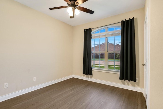3908 Crispin Hall Ln, Pflugerville, TX 78660 - unfurnished room with dark wood-type flooring, baseboards, and a ceiling fan