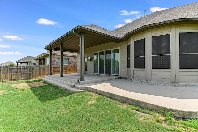 3908 Crispin Hall Ln, Pflugerville, TX 78660 - rear view of house with a patio and roof with shingles