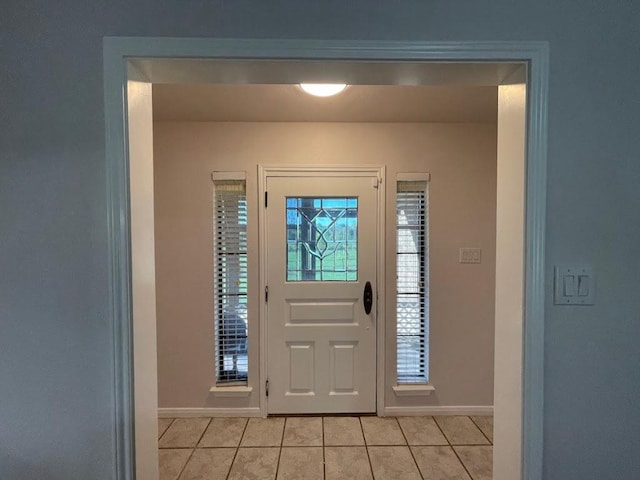 5001 Blue Bluff Rd, Austin, TX 78724 - entrance foyer featuring light tile patterned flooring and baseboards