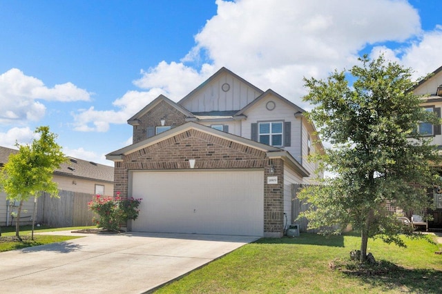 18909 James Carter Jr St, Manor, TX 78653 - craftsman house with board and batten siding, driveway, a garage, and brick siding