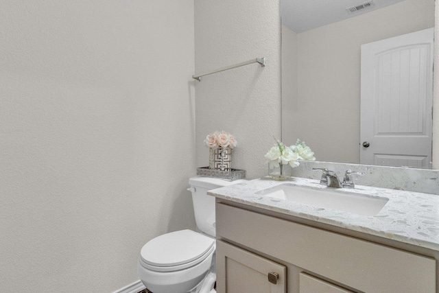 18909 James Carter Jr St, Manor, TX 78653 - half bathroom with vanity and a textured wall