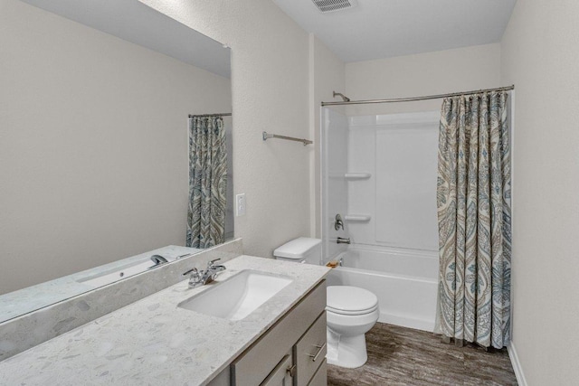 18909 James Carter Jr St, Manor, TX 78653 - bathroom featuring wood finished floors, vanity, and shower / bath combo