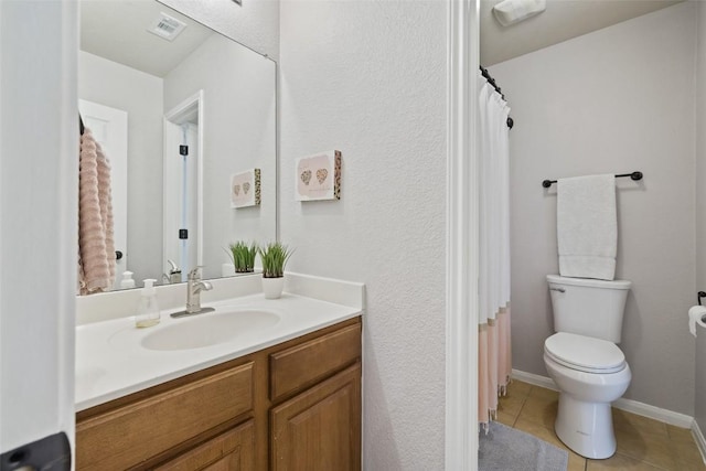 809 Bedford Ct, Georgetown, TX 78628 - full bathroom with tile patterned floors, vanity, and toilet