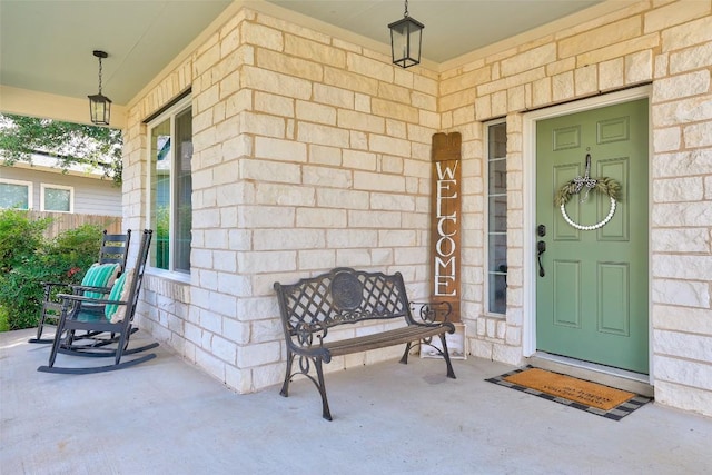809 Bedford Ct, Georgetown, TX 78628 - doorway to property featuring covered porch