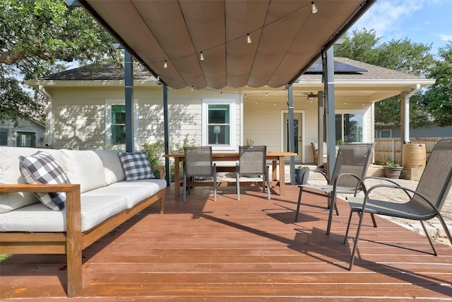 809 Bedford Ct, Georgetown, TX 78628 - wooden deck featuring an outdoor hangout area, outdoor dining space, and a ceiling fan